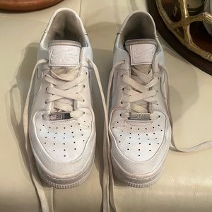 White platform Air Force 1’s